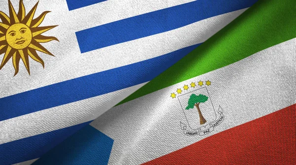 Uruguay und Äquatorialguinea zwei Flaggen Textiltuch, Textur — Stockfoto