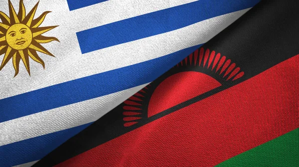 Uruguay und Malawi zwei Flaggen Textilstoff, Textur — Stockfoto