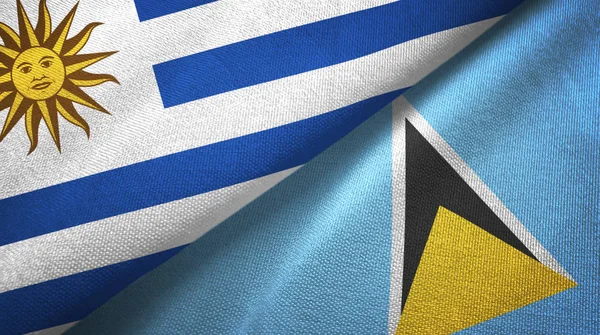 Uruguay y Santa Lucía dos banderas tela textil, textura de tela —  Fotos de Stock