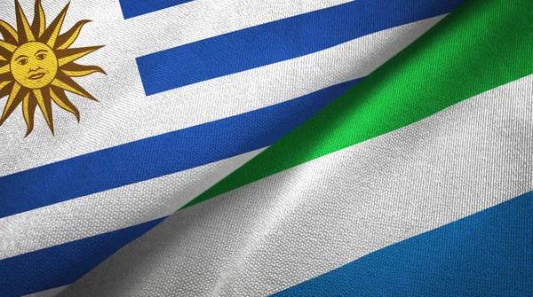 Uruguay und sierra leone zwei flaggen textiltuch, textur — Stockfoto