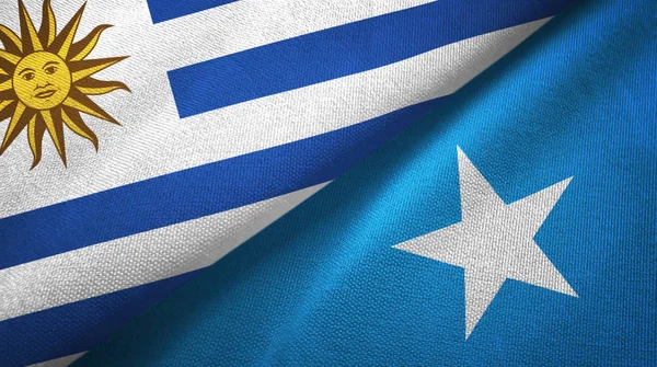 Uruguay und somalia zwei flaggen textiltuch, textur — Stockfoto