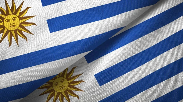 Уругвай два флага текстильная ткань, текстура ткани — стоковое фото