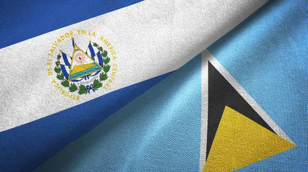 El Salvador ve Saint Lucia iki bayraklar tekstil kumaş, kumaş doku — Stok fotoğraf