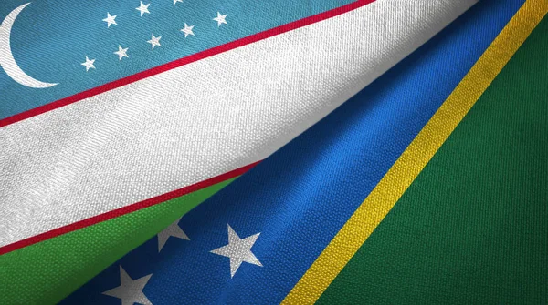Uzbekistan and Solomon Islands two flags textile cloth, fabric texture