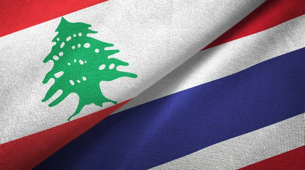 Liban et Thaïlande deux drapeaux tissu textile, texture du tissu — Photo