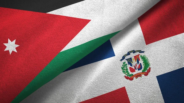 Jordanië en Dominicaanse Republiek twee vlaggen textiel doek, weefsel textuur — Stockfoto