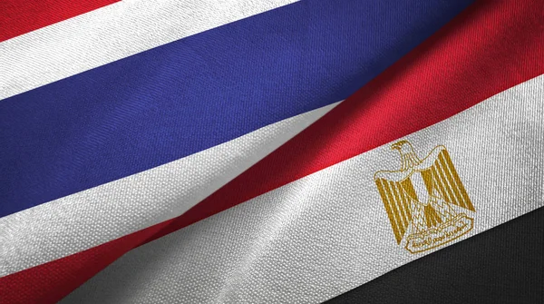 Tailândia e Egito duas bandeiras pano têxtil — Fotografia de Stock