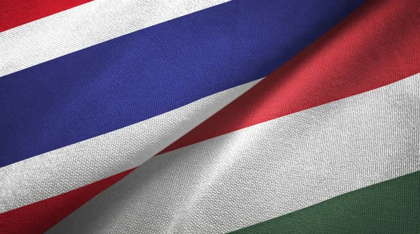 Таиланд и Венгрия два флага текстильная ткань, текстура ткани — стоковое фото