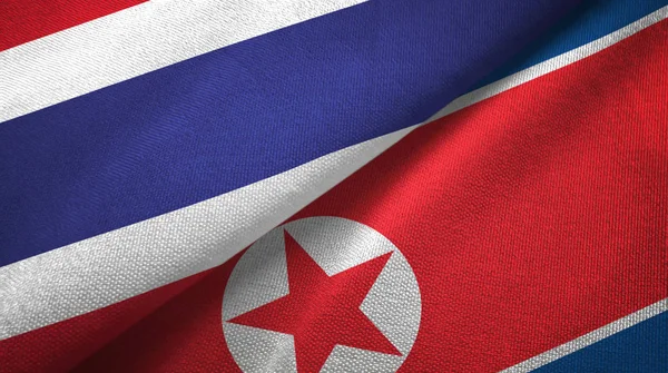 Thailand and North Korea two flags textile cloth, fabric texture