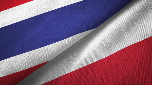 Tailândia e Polônia duas bandeiras de pano têxtil, textura de tecido — Fotografia de Stock