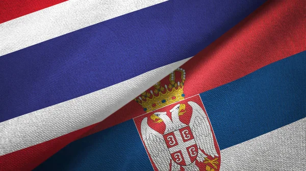 Таиланд и Сербия два флага текстильная ткань, текстура ткани — стоковое фото