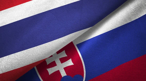 Thaiföld és Szlovákia két zászló textil ruhával, szövet textúra — Stock Fotó