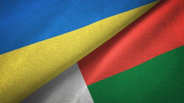 Ukrayna ve Madagaskar iki bayraklar tekstil kumaş, kumaş doku