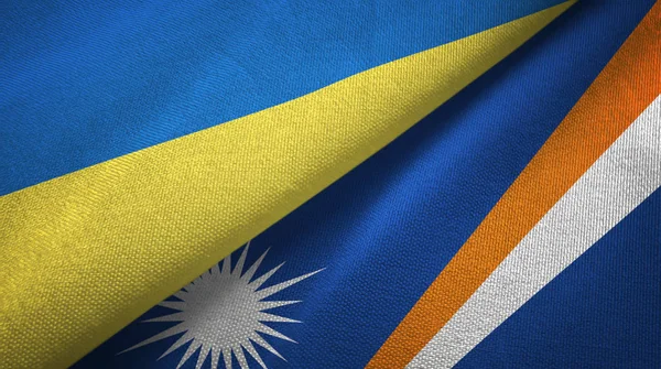 Ukraine and Marshall Islands two flags textile cloth, fabric texture — Stock Photo, Image