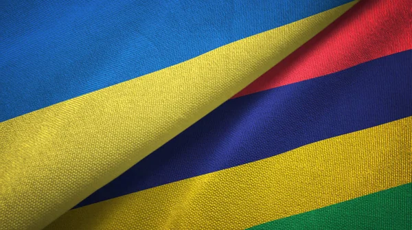 Ουκρανία και Μαυρίκιος δύο σημαίες ύφασμα υφάσματος, υφή υφάσματος — Φωτογραφία Αρχείου