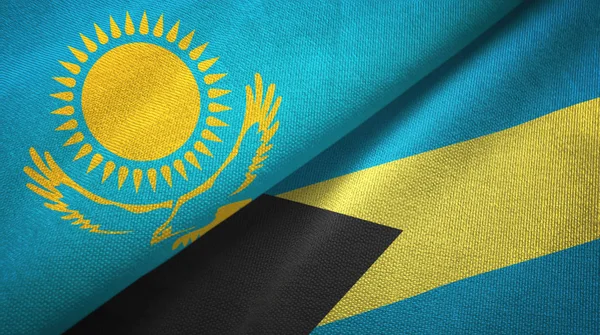 Καζακστάν και Μπαχάμες δύο σημαίες ύφασμα υφασμάτων, υφή υφάσματος — Φωτογραφία Αρχείου
