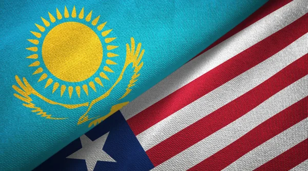 Kazakhstan and Liberia two flags textile cloth, fabric texture