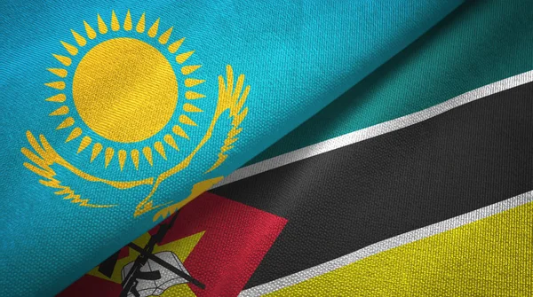 Kazajstán y Mozambique dos banderas tela textil, textura de la tela — Foto de Stock