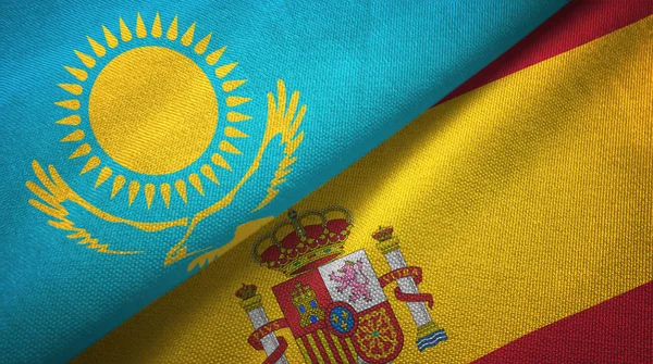 Kazakhstan and Spain two flags textile cloth, fabric texture
