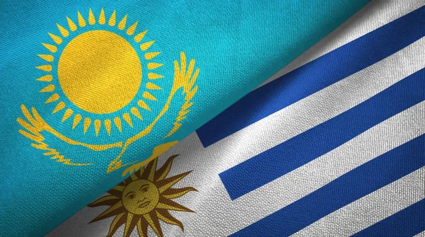 Kasachstan und uruguay zwei flaggen textiltuch, textur — Stockfoto