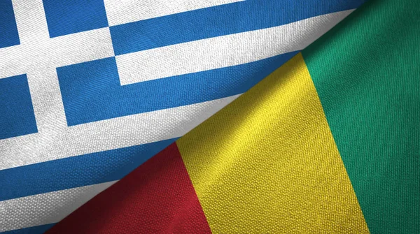 Griekenland en Guinee twee vlaggen textiel doek, weefsel textuur — Stockfoto