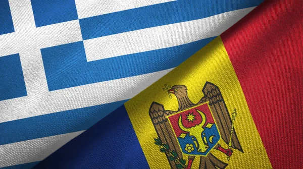 Griekenland en Moldavië twee vlaggen textiel doek, weefsel textuur — Stockfoto
