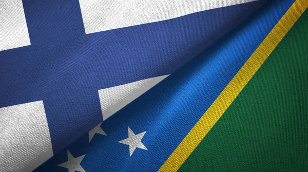 Finland and Solomon Islands two flags textile cloth, fabric texture