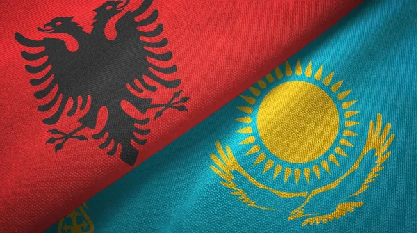 Albania and Kazakhstan two flags textile cloth, fabric texture