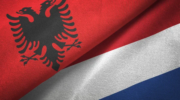 Albania and Netherlands two flags textile cloth, fabric texture