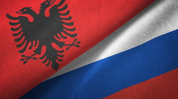 Albania and Russia two flags textile cloth, fabric texture