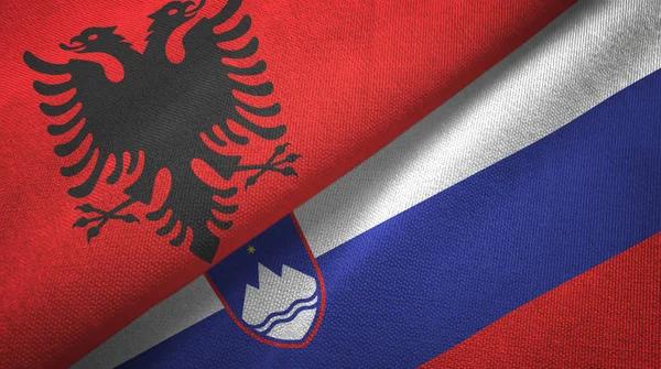 Albania and Slovenia two flags textile cloth, fabric texture