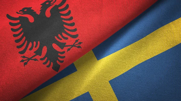 Albania and Sweden two flags textile cloth, fabric texture