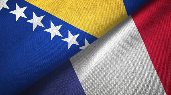 Bosnia y Herzegovina y Francia dos banderas tela textil, textura de la tela — Foto de Stock