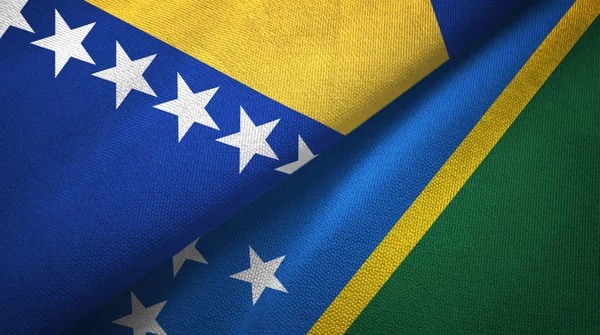 Bosnia y Herzegovina y las Islas Salomón dos banderas de tela textil — Foto de Stock