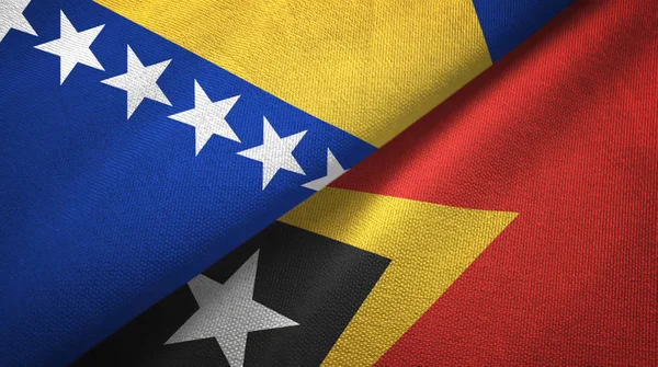 Bosnia y Herzegovina y Timor Oriental Timor Oriental dos banderas de tela textil — Foto de Stock