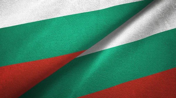 Bulgaria două steaguri pânză textilă, textură țesătură — Fotografie, imagine de stoc
