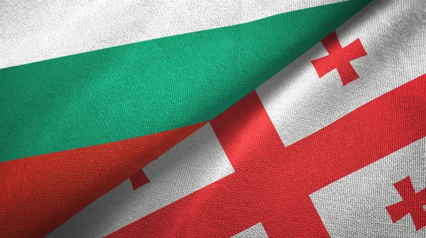 Bulgarije en Georgië twee vlaggen textiel doek, weefsel textuur — Stockfoto