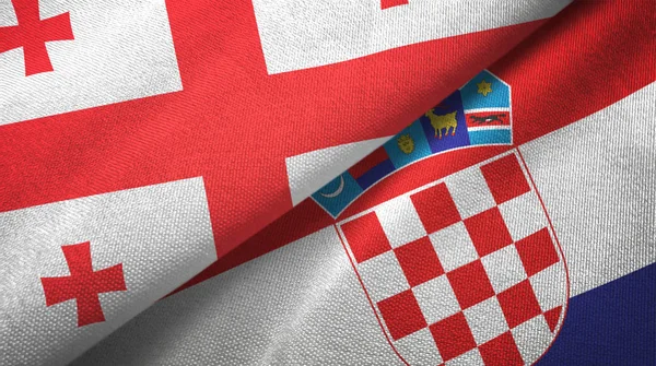 Georgia y Croacia dos banderas tela textil, textura de la tela — Foto de Stock