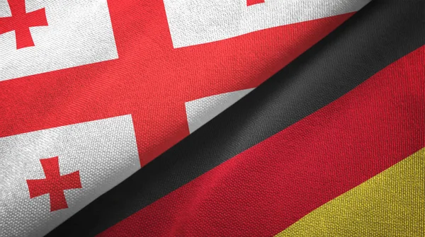 Georgia and Germany two flags textile cloth, fabric texture