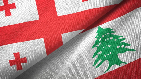 Géorgie et Liban deux drapeaux tissu textile, texture du tissu — Photo