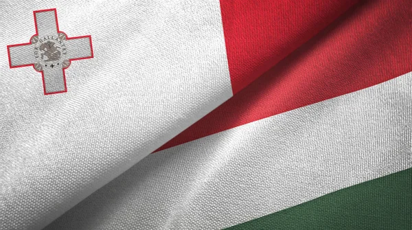 Malta and Hungary two flags textile cloth, fabric texture