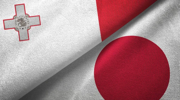 Malta i Japonia dwie flagi tkanina tekstylna, tekstura tkaniny — Zdjęcie stockowe