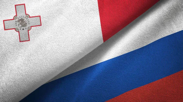 Malta and Russia two flags textile cloth, fabric texture