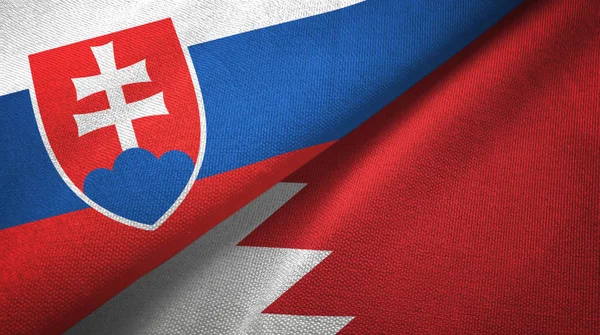 Eslovaquia y Bahréin dos banderas tela textil, textura de la tela —  Fotos de Stock