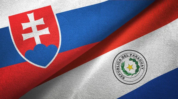 Slovakia and Paraguay two flags textile cloth, fabric texture — Stock Photo, Image