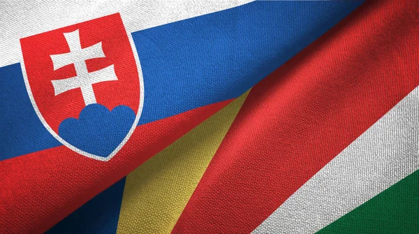 Slovakia and Seychelles two flags textile cloth, fabric texture — Stock Photo, Image