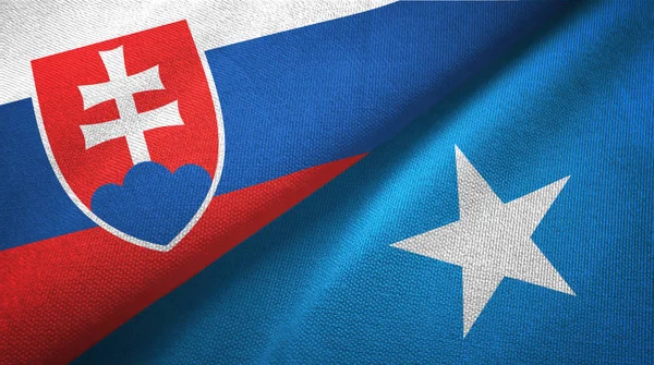 Η Σλοβακία και η Σομαλία δύο σημαίες υφάνσιμα υφάσματα, υφή υφάσματος — Φωτογραφία Αρχείου