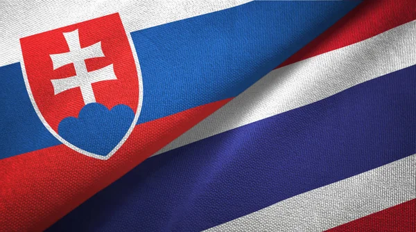 Словакия и Таиланд два флага текстильная ткань, текстура ткани — стоковое фото