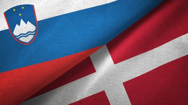 Slovenia and Denmark two flags textile cloth, fabric texture