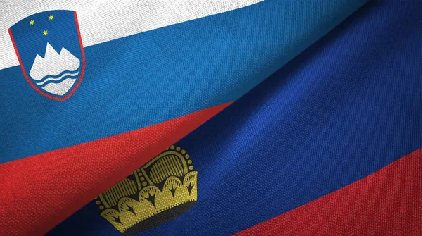 Eslovenia y Liechtenstein dos banderas tela textil, textura de la tela —  Fotos de Stock